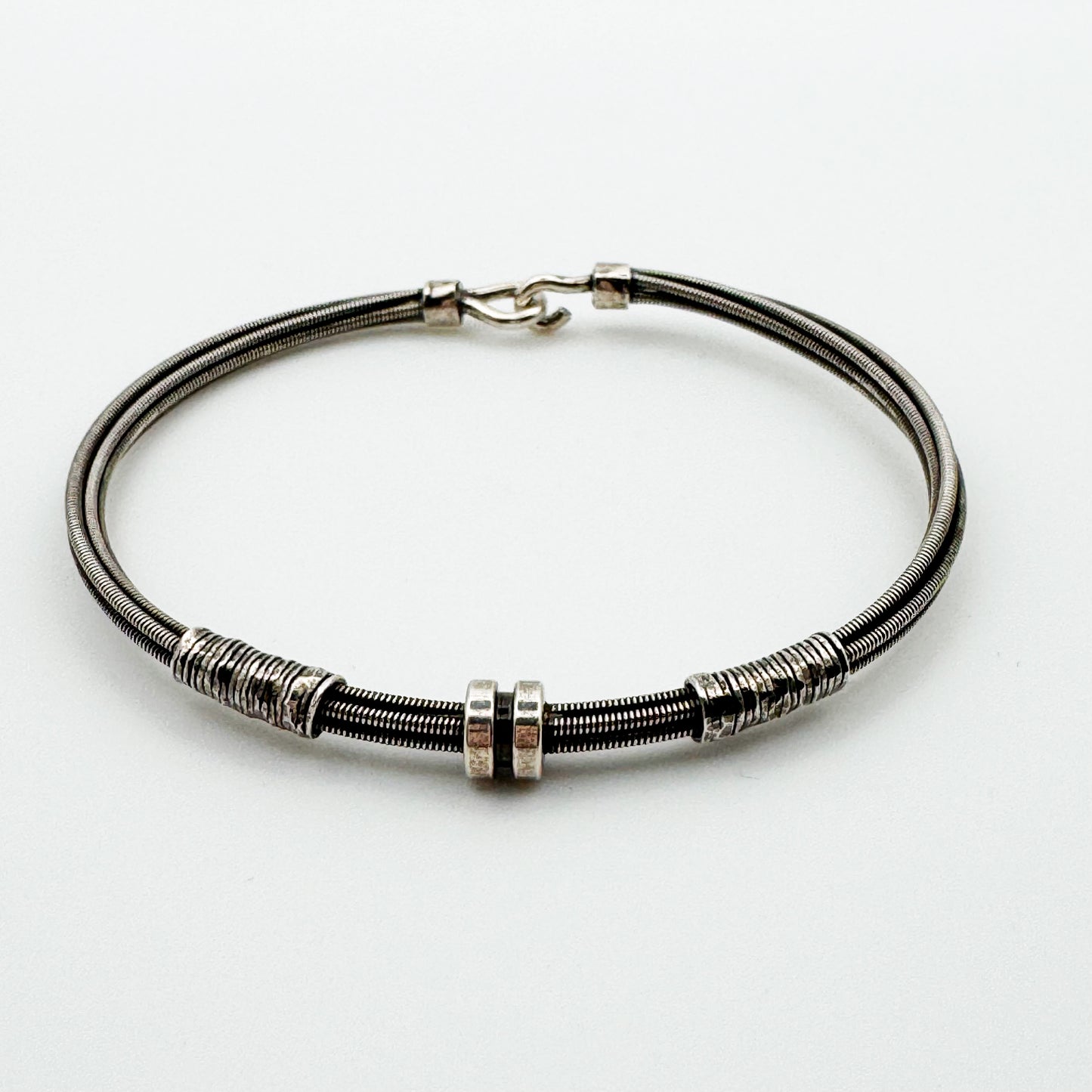 Bracelet multi corde de guitare 1 fixation