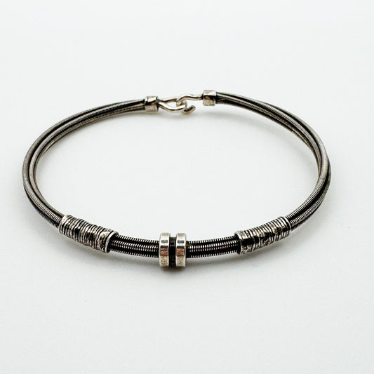 Bracelet multi corde de guitare 1 fixation